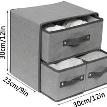Caja Organizadora Plegable con 3 Cajones de Tela – Orden y estilo para tu hogar, Esta práctica caja organizadora está diseñada para facilitarte la vida. Consta de 3 cajones amplios, fabricados en tela resistente y ligera, perfecta para organizar tu ropa interior, calcetines, cosméticos, papelería, juguetes, artículos de oficina y mucho más.  Gracias a su diseño plegable, puedes guardarla fácilmente cuando no esté en uso, ahorrando espacio. Su estructura flexible permite colocarla en estantes, clósets, escritorios o incluso debajo de la cama. Además, sus cajones tienen asa frontal, lo que facilita abrir y cerrar sin esfuerzo. Ideal para dormitorios, baños, salas de estar, habitaciones infantiles, oficinas o cualquier rincón que necesite un toque de orden. Su acabado sobrio y elegante combina con cualquier decoración. - Gris - Ver 5