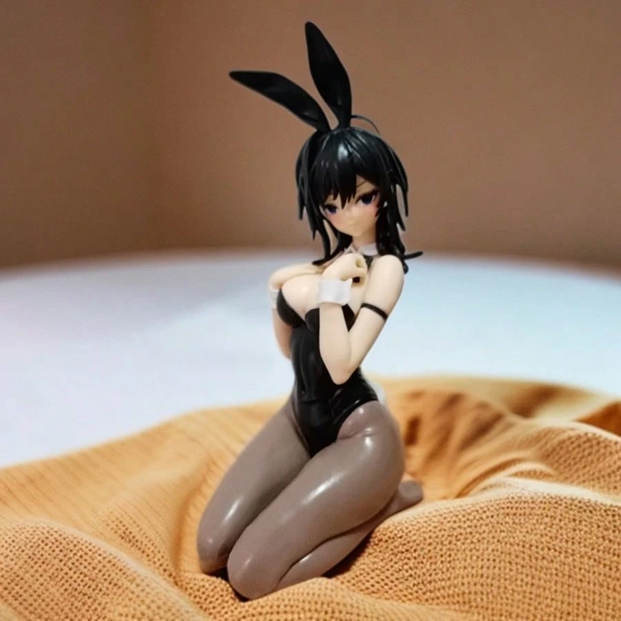 15.5 cm tall resin bunny girl figure with black hair and costume, kneeling on the ground