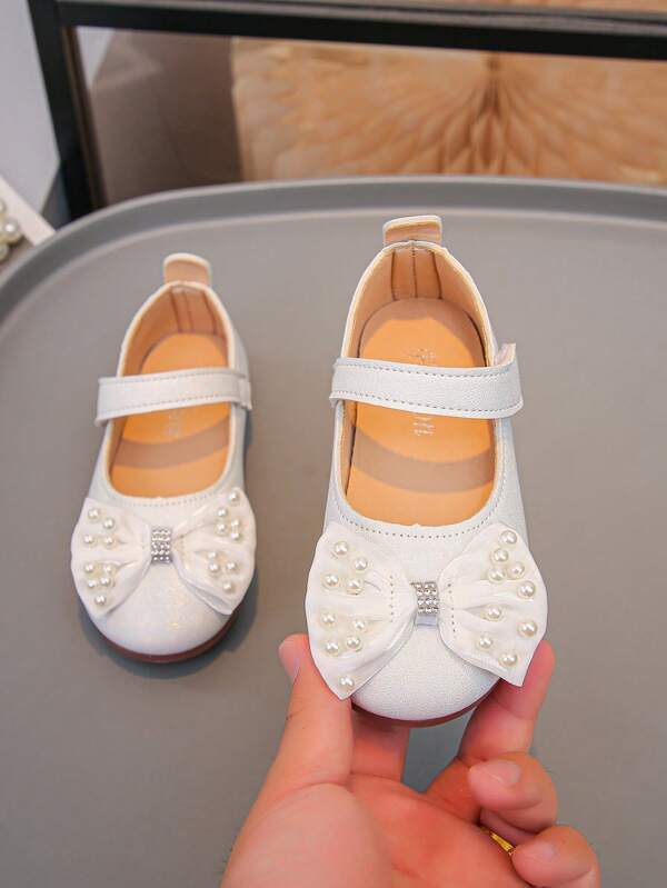 1 par de zapatos de princesa para niñas, con decoración de moño y perlas, suela blanda y ligera para baile y actuaciones, zapatos para niños, primavera/verano 2025
