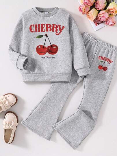 Conjunto de sudadera de cuello redondo y pantalones acampanados con estampado de cerezas para niños pequeños