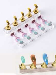 80件套粉色系列美甲工具套装，包含48格可重复使用的美甲泥、10个美甲支架+2个透明底座、15支美甲笔+5支点钻笔，可用于展示和练习美甲贴纸，磁性假指甲支架方便专业美甲练习，套装内含美甲胶水和假指甲，适合DIY新手和家庭美甲沙龙使用，是送给女性的绝佳圣诞礼物。