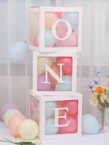 适合男孩或女孩的一周岁生日装饰套装，包含3个“ONE”字样气球、透明积木拼成的“ONE TWO THREE”字母，可用作拍照道具和蛋糕背景。不含气球。 - 白色 - 查看 3