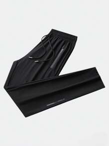 男士轻便透气弹力跑步裤，夏季穿着，带拉链口袋和抽绳腰带，采用柔软舒适的冰丝面料，纯色运动裤，适合休闲、户外、健身、度假、钓鱼等场合。 - 黑色 - 查看 4