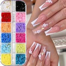 12格彩色五瓣花美甲饰品提供丰富的色调，包括蓝色、黄色、粉色、红色等。如此丰富的色彩组合，让您轻松搭配不同颜色的指甲油，打造适合各种场合的独特美甲造型。美甲用品 美甲 美甲饰品 美甲宝石