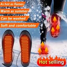 1双全脚掌覆盖式电加热鞋垫，USB插头设计，舒适贴合，耐热面料保护，适用于滑雪、露营和狩猎。