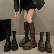 Botas femininas até o joelho