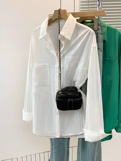 Chemise décontracté unie à manches longues, épaules tombantes, simple boutonnage et poches pour femmes