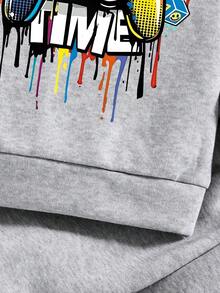 Komplet dla malucha z bluzą i spodniami z nadrukiem w kreskówkowym stylu i ciepłym okrągłym dekoltem