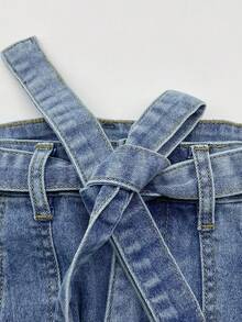 Pantalones vaqueros casuales con bolsillos lindos y lazo, estilo suelto y cómodo, inspirado en Europa y Estados Unidos