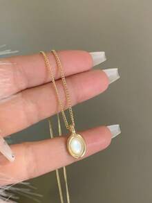 1 时尚优雅的猫眼石贝壳吊坠，独特简约的项链，适合女性百搭的日常珠宝佩戴