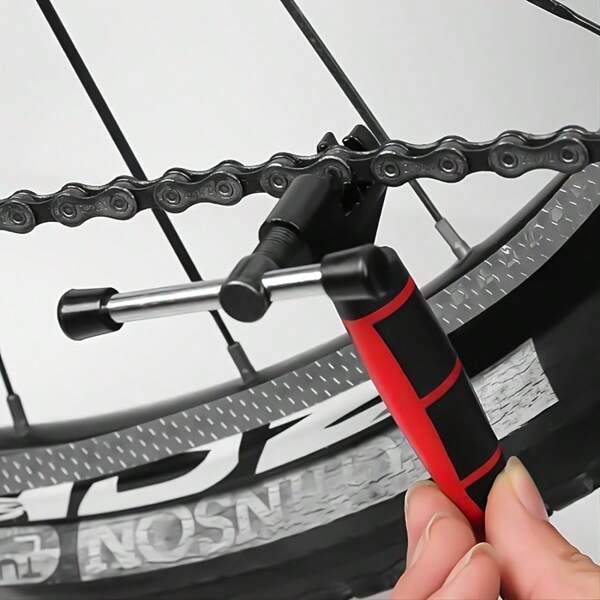 Herramienta portátil de acero inoxidable para romper cadenas de bicicleta - Fácil de desmontar cadenas de bicicleta de montaña, mango negro ergonómico para reparación rápida, diseño simple, portátil y seguro, adecuado para todos los ciclistas, soluciona problemas de cadena durante el ciclismo, aplicable a varios tipos de bicicletas, herramienta de reparación multifuncional, herramienta de corte de cadena de ciclismo, equipo esencial para entusiastas del ciclismo, regalo perfecto para un amigo