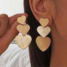 1对时尚金属几何扭曲水滴耳环