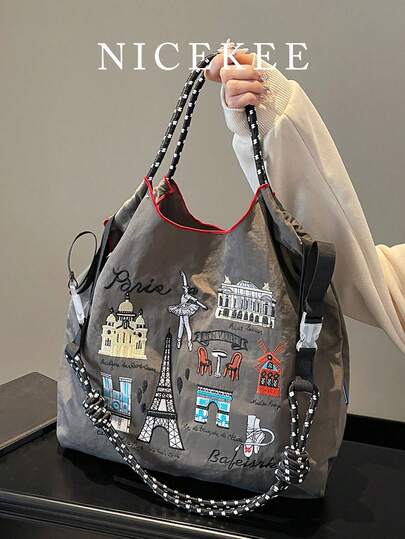 小众设计刺绣手提包，轻便易携大容量购物袋，时尚复古撞色手提包，可调节肩带斜挎包，适合日常购物和通勤上班。