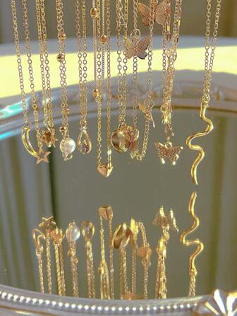 Set de 9 piezas de collar multicapa con colgantes de diseño vintage elegante y minimalista, incluyendo corazón, mariposa, borla, rhinestone, perla falsa, gota de agua, serpiente, estrella y luna, adecuado para vacaciones, fiestas, citas, regalos y uso diario