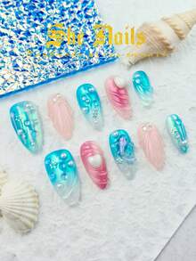 DIY夏季新款美甲：10片装多巴胺海洋元素杏仁形手工按压式美甲贴片。蓝色和粉色美甲贴片，包含3D爱心、水波纹、星星、鱼、小珍珠、小钻石等海洋元素，是春夏搭配的理想之选，也是沙滩比基尼泳装的首选。美甲用品 - 彩色 - 查看 1