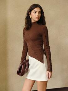 Chemise T femme à col montant élégante avec ourlet asymétrique - couleur unie, extensible, convient pour le printemps et l'automne, tissu en maille lavable en machine