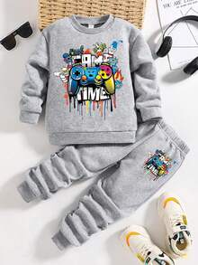 Komplet dla malucha z bluzą i spodniami z nadrukiem w kreskówkowym stylu i ciepłym okrągłym dekoltem