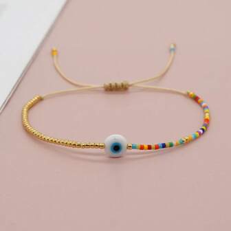 1 pieza Pulsera ajustable con cuentas de semillas y ojo malvado de vidrio, blanco