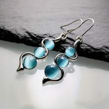 1 Pair Bohemian Creative Wavy Blue Earrings - Hypoallergenic - Suitable For Daily Wear And As Gifts, Holiday Parties, Birthday Parties, New Year And Valentine'S Day Presents Bohemian Creative Curve Wave Earrings European And American Inlaid Hyland Cat's Eye Gemstone Earrings