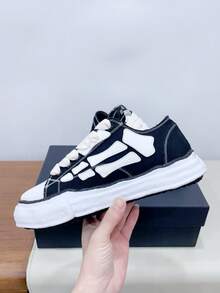 MMY Maison Minara Yasuhiro 2025 Nouvelle collaboration MMY avec un designer renommé. Chaussures de skate basses classiques antidérapantes, résistantes à l'usure et légères. Chaussures de campus pour amateurs en noir et blanc