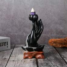 1件，佛手回流香炉，小巧便携（附赠6根回流香棒）。可作为吉祥家居装饰、节日礼物，适合万圣节和圣诞夜装饰、旅行必备、大学宿舍必备以及圣诞派对礼物。