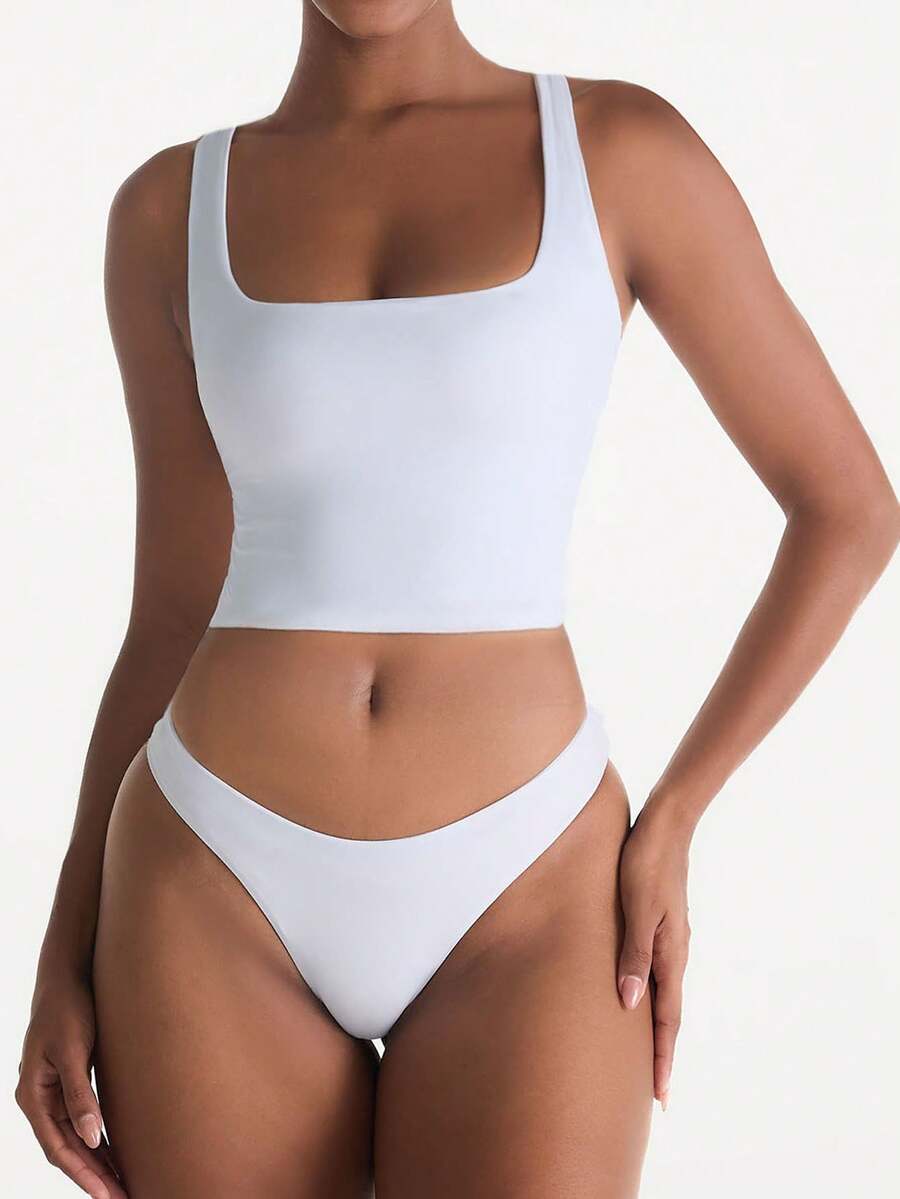Áo tank top trắng ngắn gợi cảm, chất liệu co giãn cao cấp hai lớp, cổ vuông thời trang, áo hai dây ôm sát thoải mái, thích hợp cho mùa tựu trường hè. - trắng - Xem 1
