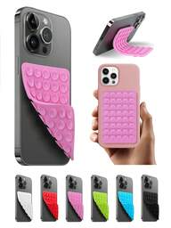 1 ชิ้น ที่ยึดโทรศัพท์แบบดูดสองด้าน ทำจากซิลิโคน, การออกแบบที่ชาญฉลาด แบบไม่ใช้มือ, ช่วยให้คุณสามารถติดตั้งโทรศัพท์ของคุณบนกระจก หน้าต่าง และพื้นผิวเรียบอื่นๆ ได้อย่างง่ายดาย. แต่ละด้านมีถ้วยดูดอิสระ 40 ถ้วย เพื่อการยึดที่แข็งแรงและมั่นคงมากขึ้น ป้องกันไม่ให้โทรศัพท์ตกระหว่างใช้งานในครัว, ยิม, สตูดิโอเต้นรำ, ห้องน้ำ เพื่อถ่ายรูป, ดูวิดีโอ, วิดีโอคอล. สามารถใช้เป็นขาตั้งโทรศัพท์บนโต๊ะได้ด้วย'