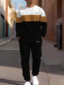Conjunto de sudadera de manga larga y pantalones con bloqueo de color y estampado de la palabra "REY", suéter de cuello redondo minimalista de moda, chándal versátil para ejercicio y actividades al aire libre, ropa de otoño