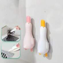 1 pieza Clip de baño de 2 en 1 con forma de pato, clip de basura de doble cabeza estable, pinzas montadas en la pared para la eliminación de polvo y manchas