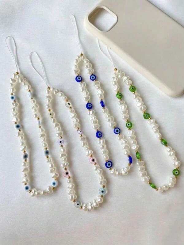 1 pièce Accessoires de coque de téléphone imitant l'œil du diable avec perles, dragonne de téléphone, écouteur sans fil, pendentif de dragonne d'appareil photo (couleur aléatoire)