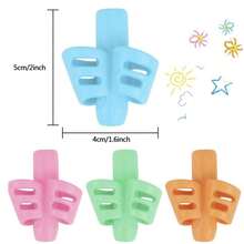 1 pièce/2 pièces Outil d'écriture à double prise en silicone, correcteur de posture d'écriture, prise de stylo en silicone souple et colorée pour enfants, étudiants, dispositif de correction de la posture d'écriture, protecteur de doigt
