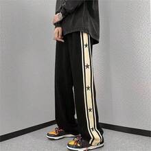 Pantalones de hombre con diseño de patrón de stars y ribete de contraste, estilo holgado tipo paracaídas y largo, color negro liso para salir - Negro - Ver 2