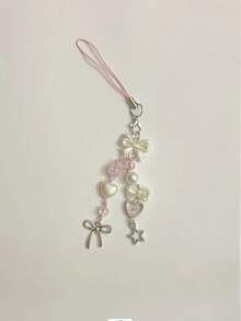 1条创意珍珠蝴蝶结粉色手机挂绳/相机背带。注意：由于拍摄角度和放大倍数不同，实际尺寸可能与照片略有差异。