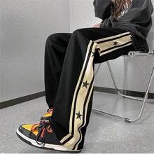 Pantalones de hombre con diseño de patrón de stars y ribete de contraste, estilo holgado tipo paracaídas y largo, color negro liso para salir - Negro - Ver 5