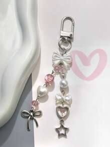 1条创意珍珠蝴蝶结粉色手机挂绳/相机背带。注意：由于拍摄角度和放大倍数不同，实际尺寸可能与照片略有差异。