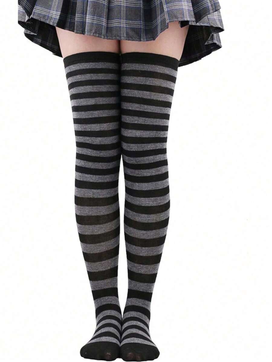 A Pair Of Black And Gray Female Striped Knee-High Stockings, Suitable For Outdoor Sports.