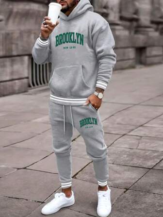 2026 Fall/Winter Best-Selling Comfortable And Minimalist Fit Spliced Jacquard Ribbed Cuff Sweatshirt Set, Hooded Top With Large Pockets, Pants With Adjustable Trouser Cords, Fashionable Letter Large Pattern Print Design, Perfect For Autumn And Winter Casual, Sports, Outdoor, Home Daily Wear