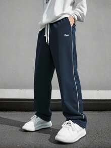 Pantalones de hombre de patrón de letras y ribete con diseño  de contraste, estilo holgado tipo paracaídas y largo, color negro liso para salir - Azul Marino - Ver 3