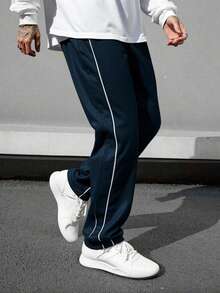 Pantalones de hombre de patrón de letras y ribete con diseño  de contraste, estilo holgado tipo paracaídas y largo, color negro liso para salir - Azul Marino - Ver 2