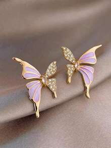 1 para eleganckich, luksusowych kolczyków w kształcie motyli z kapiącą ropą, wysokiej klasy design