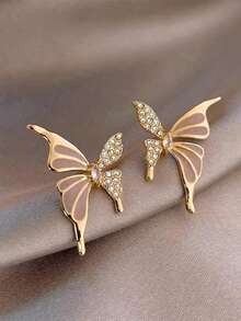 1 para eleganckich, luksusowych kolczyków w kształcie motyli z kapiącą ropą, wysokiej klasy design