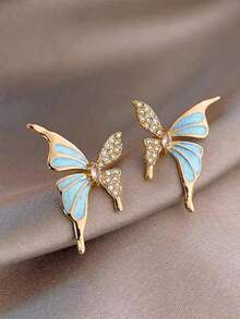 1 para eleganckich, luksusowych kolczyków w kształcie motyli z kapiącą ropą, wysokiej klasy design