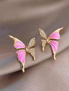 1 para eleganckich, luksusowych kolczyków w kształcie motyli z kapiącą ropą, wysokiej klasy design