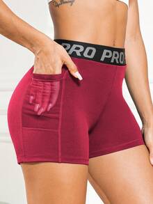 High Waist Women's Yoga Shorts With Tummy Control - Letter Graphic Butt Lifting Gym Activewear With Mesh Pocket - Burgundy - View 3