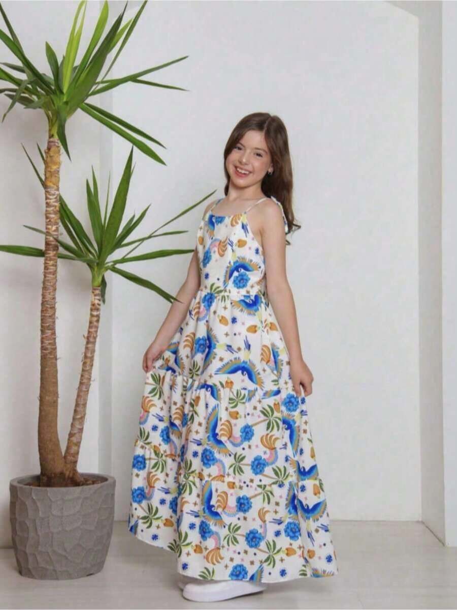 Girls' Long Summer Printed Dress With Bow On The Back, White And Blue, Bird And Flower Print, Flared Model For Girls, Light And Comfortable Fabric, Thin Straps, Ideal For Outings, Parties, Vacations, Beach And Everyday Life - Sizes 10 To 16 Years - Colorful And Fun Look With Tropical Print Of Birds And Coconut Trees, Fresh Dress With Movement, Modern And Stylish Children's Clothing For Girls, Teen Girl's Printed Dress With Delicate And Charming Style, Printed Women's Fashion With A Touch Of Summer, Children's Strap Dress For Grown Girls, Cheerful And Vibrant Print For Special Occasions And Casual Use, Comfortable Children's Clothing With A Loose Fit, Ideal For Hot Weather, Colorful Fashion For Stylish Girls, Dress With Exclusive Print And Bow Detail On The Back For An Authentic And Charming Look, Lightweight Long Dress For Teenage Girls, Stylish Long Women's Printed Dress For Youth Party - 彩色 - 查看 1