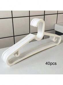 Pacote com 40/20/10 cabides finos de plástico preto, leves e resistentes, economizam espaço, adequados para pendurar camisetas e camisas, cabides finos, design antiqueda