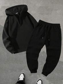 (Autunno/Inverno) Set tuta da uomo, composto da felpa con cappuccio e mezza chiusura lampo, coulisse in vita, pantaloni 3/4 tinta unita. Completo sportivo alla moda, felpa con cappuccio adatta per corsa, allenamento, stile casual boyfriend. Outfit comodo.
