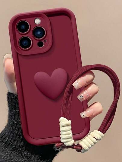 1个简约柔和的纯红色手机壳，饰有3D爱心图案，并配有同款挂绳，专为 17 Pro Max、13、16、A56 5G、13 Mini、17设计——日常、通勤和约会必备手机配件