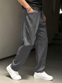 Pantalones casuales de unicolor y ajuste delgado para hombres, adecuados para el uso diario en primavera, otoño y verano, con cintura con cordón, tela ligera, pantalones cargo con parches y personalidad - Gris Oscuro - Ver 7
