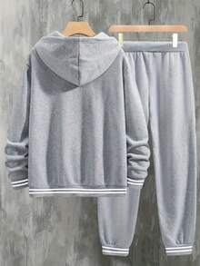 Najlepiej sprzedający się zestaw jesień/zima 2026: Wygodna i minimalistyczna bluza z żakardowym ściągaczem i mankietami, bluza z kapturem i dużymi kieszeniami, spodnie z regulowanymi sznurkami, modny nadruk z dużymi literami, idealny na co dzień jesienią i zimą, do uprawiania sportu, na zewnątrz, do noszenia w domu